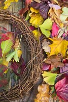 Creating an autumnal leaf wreath.