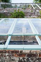 Restored cold frames containing plants for sale, propagated from the garden. Littlebredy Walled Gardens, Littlebredy, Dorset