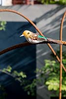 Decorative bird on builders rod