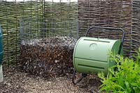 Rotary composter and traditional wire netting container for leaves