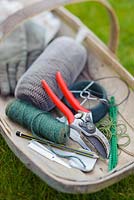 Sussex trug with tools for labelling and tying up.