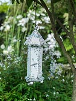 A decorative bird feeder.