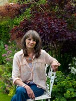 Judith Glover, an experienced gardener who mentors her neighbour helping her to develop her garden.