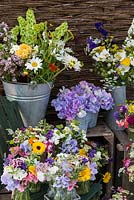 At Organic Blooms, flowers are grown for cutting and arranging. They include marigold, cosmos, larkspur, ammi, sweet peas, clary sage, scabious, sweet william, achillea, nicotiana, cornflower, clarkia, feverfew, zinnia and statice.