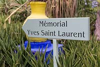 Sign to the Yves Saint Laurent memorial garden. Jardin Majorelle, Yves Saint Laurent garden