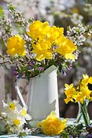 Floral arrangements of daffodils, Pulmonaria officinalis and Japanese quince