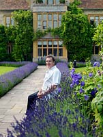 Raymond Blanc, celebrity chef, pictured by the lavender walk leading to his hotel and restaurant, Le Manoir aux Quat'Saisons.
