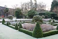 Box parterre in winter with viaduct in background - Kilver Court, Somerset
