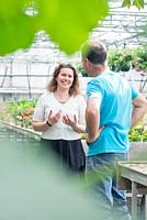 Gerrit van der Velde talking with Katarina Brandt of Ludic Landscapes visiting the nursery at Heerde to select pelargoniums for her garden '101 Pelargoniums' at the gardenfestival of Chaumont sur Loire.