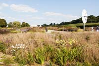 The Oudolf Field and view to the Ruddock Pavilion. Hauser and Wirth, Bruton, Somerset. Planting design by Piet Oudolf.