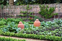 Walled kitchen garden with forcing pots - Late April - Kew Gardens, London, UK