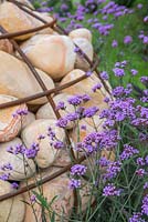 Planting of Verbena bonariensis beside the unique Gabion sculpture shaped like a bulb