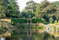 Ionic Temple and The Long Border reflecting in the pond at Forde Abbey, Somerset