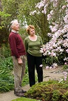John and Brena Foster admiring their Magnolia at Gable House