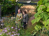 Mark and Angela Chambers, in their garden at Bretforton Manor.