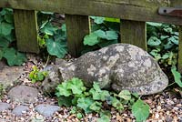 A stone sculpture of a cat.
