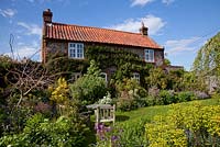 Hill Cottage, in the village of Edingthorpe, north Norfolk.  Front garden border 