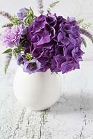 Bouquet of purple Hydrangea, Dianthus, Lisianthus, Veronica ansd Thaspi