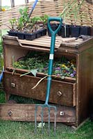 Potting bench made from an old chest of drawers at RHS Tatton Flower Show 2015