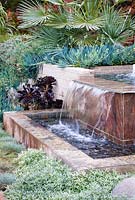 Modern water feature. Debora Carl's garden, Encinitas, California, USA. August.