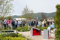 Visitors to the RHS Malvern Spring Festival 2016 looking at the 'Time is a Healer' garden
