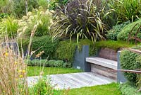 Wooden integral bench and decking at Bhudevi Estate garden, Marlborough, New Zealand.
