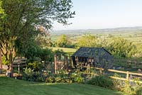 View across vegetable garden with shed, looking towards the Blackmore Vale