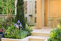 A Suffolk Retreat. An Arts and Crafts inspired garden made from local Suffolk artisinal crafts. Sponsor: The Pro Corda Trust. Designer: Freddy Whyte. RHS Chelsea Flower Show, 2016.