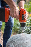 Place the vintage copper planters upside down and use a drill to create drainage holes