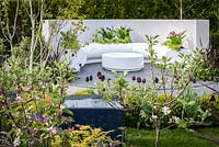 Curved seating area with white Halo seats and mixed planting - Hidden Gems of Worcestershire, RHS Malvern Spring Festival 2016. Design: Nikki Hollier. Silver, Best Festival Garden