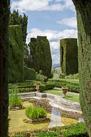 Villa Gamberaia, Settignano, Florence, Tuscany, Italy. View across the pond in the Formal Italianate garden