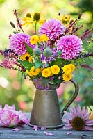 Jug of perennials: Echinacea purpurea, Helianthus, Persicaria amplexicaurus, Monarda, Chrysanthemum Yellow Button Pompon, dahlias