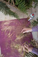 Remove the ferns once the spray paint has dried up