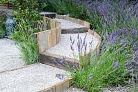 A circular, stepped gravel pathway surrounderd by lavender. Hampton Court Flower Show 2016