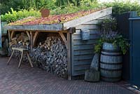 Wood store with living roof