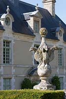 Stone decorative sculpture of birds at Chateau de Brecy, Normandy, France