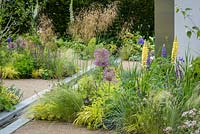 Mixed Summer border with Alliums. Cruse Bereavement Care: 'A Time for Everything' - RHS Chatsworth Flower Show 2017 - Designer: Neil Sutcliffe - Sponsor: London Stone