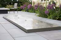 Modern rectangular water feature on patio