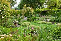 Mixed planting of vegetables and flowers - Hetty van Baalen garden, The Netherlands