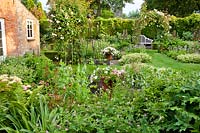 Mixed planting of vegetables and flowers - Hetty van Baalen garden, The Netherlands