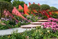 Multi-stemmed Viburnum rhytidophyllum, Rhododendron and   Paeony in Silk Road Garden, Chengdu, China - RHS Chelsea Flower Show 2017 - Designer: Laurie Chetwood and Patrick Collins Sponsor: Creativersal