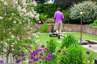 Mowing a lawn with hand powered cyclinder lawnmower, May