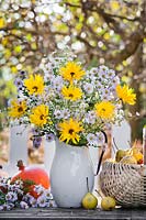 Jug of Asters, Dahlias and Helianthus.