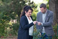 Anne Adams tea-sommelier and Johan Jansen, owner of Special Plant Zundert, in garden with Camillia Sinensis.