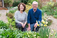 Richard Hobbs and Sally Ward in their front garden in early spring