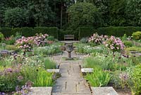 Sylvia's Garden at Newby Hall, a sunken, formal layout of beds with a Byzantine stone corngrinder.