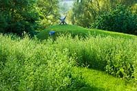 Meadow garden with modern sculptures - Asthall Manor, Oxfordshire
