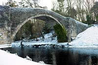 The Auld Brig O'Doon, Burns National Heritage Park, Alloway, Ayr, Scotland in winter