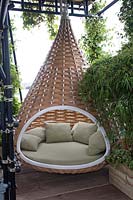 Woven hanging seat in The Westland Magical Garden by Diarmuid Gavin at RHS Chelsea Flower Show 2012