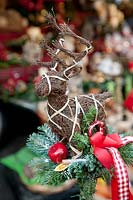 Christmas arrangement with a willow reindeer